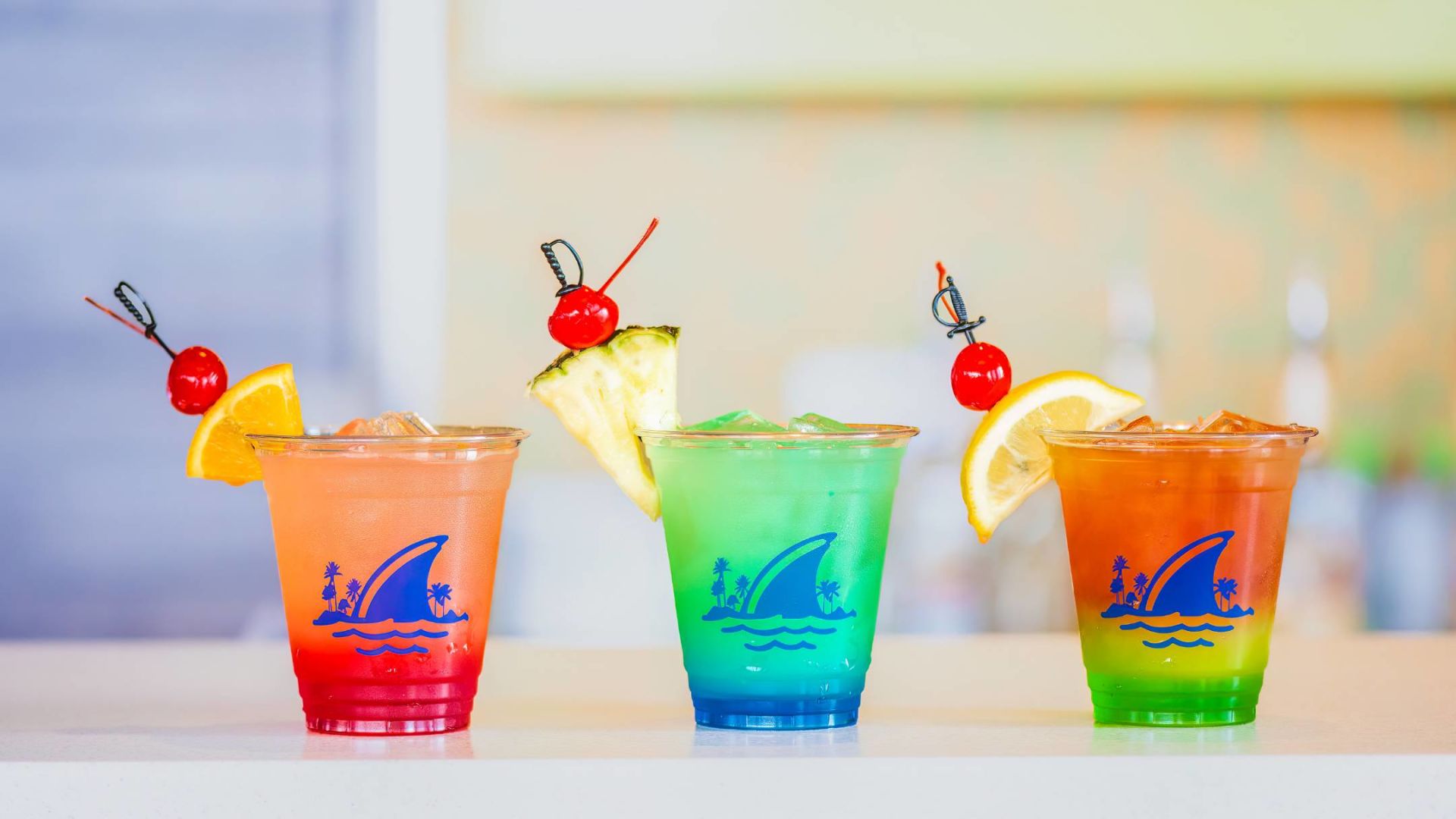 A Group Of Colorful Drinks