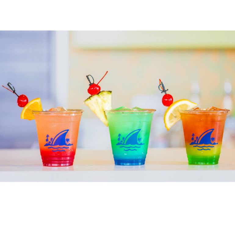 A Group Of Colorful Cups With Straws In Them